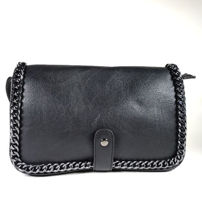 Bolso polipiel detalle cadena