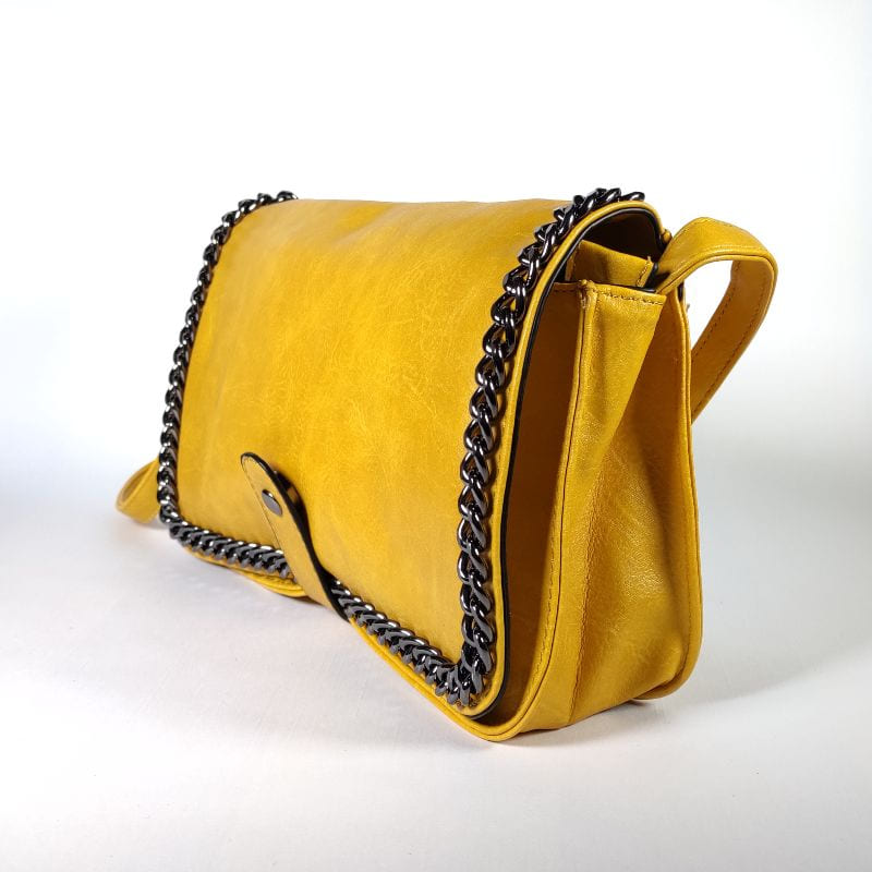 Bolso polipiel detalle cadena
